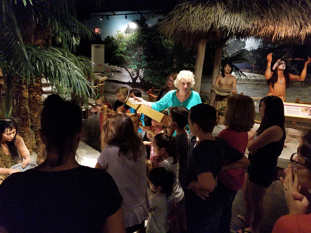 Volunteers through Calusa gallery